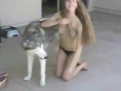 Naked young blond puss seduces a husky